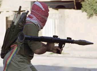 Боевик в Эль-Фаллуджа. Фото Reuters