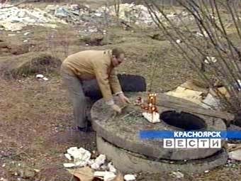Коллектор, в котором были обнаружены останки детей, кадр телеканала "Россия", архив