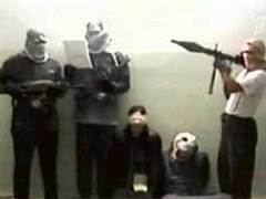 Иракские боевики. Кадр, переданный Первым каналом, архив Иракские боевики. Кадр, переданный Первым каналом, архив