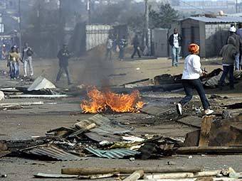 Неблагополучный квартал Йоханнесбурга. Фото ©AFP